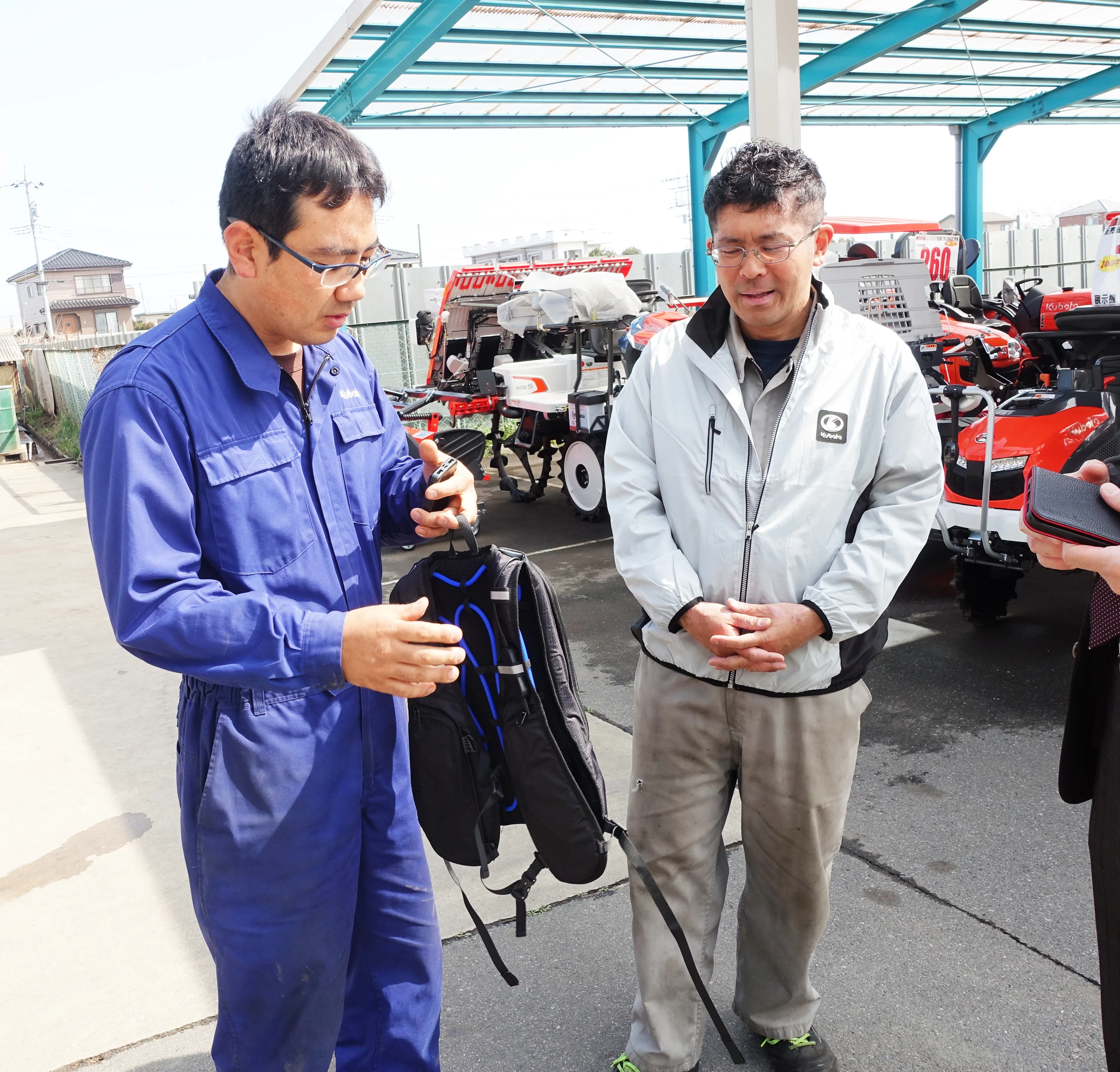 株式会社トミタモータース様の着用イメージ